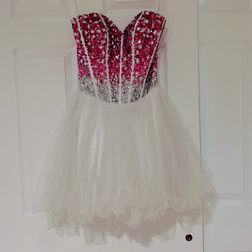White mini dress. pink/silver jewel top. Size 0/2. Worn once. Price negotiable